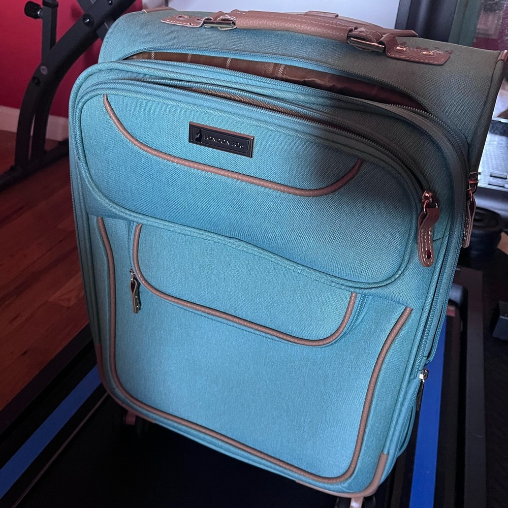 London Fog rolling luggage turquoise with brown trim